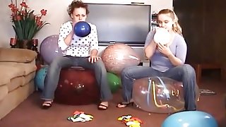 2 Girls Popping Balloons